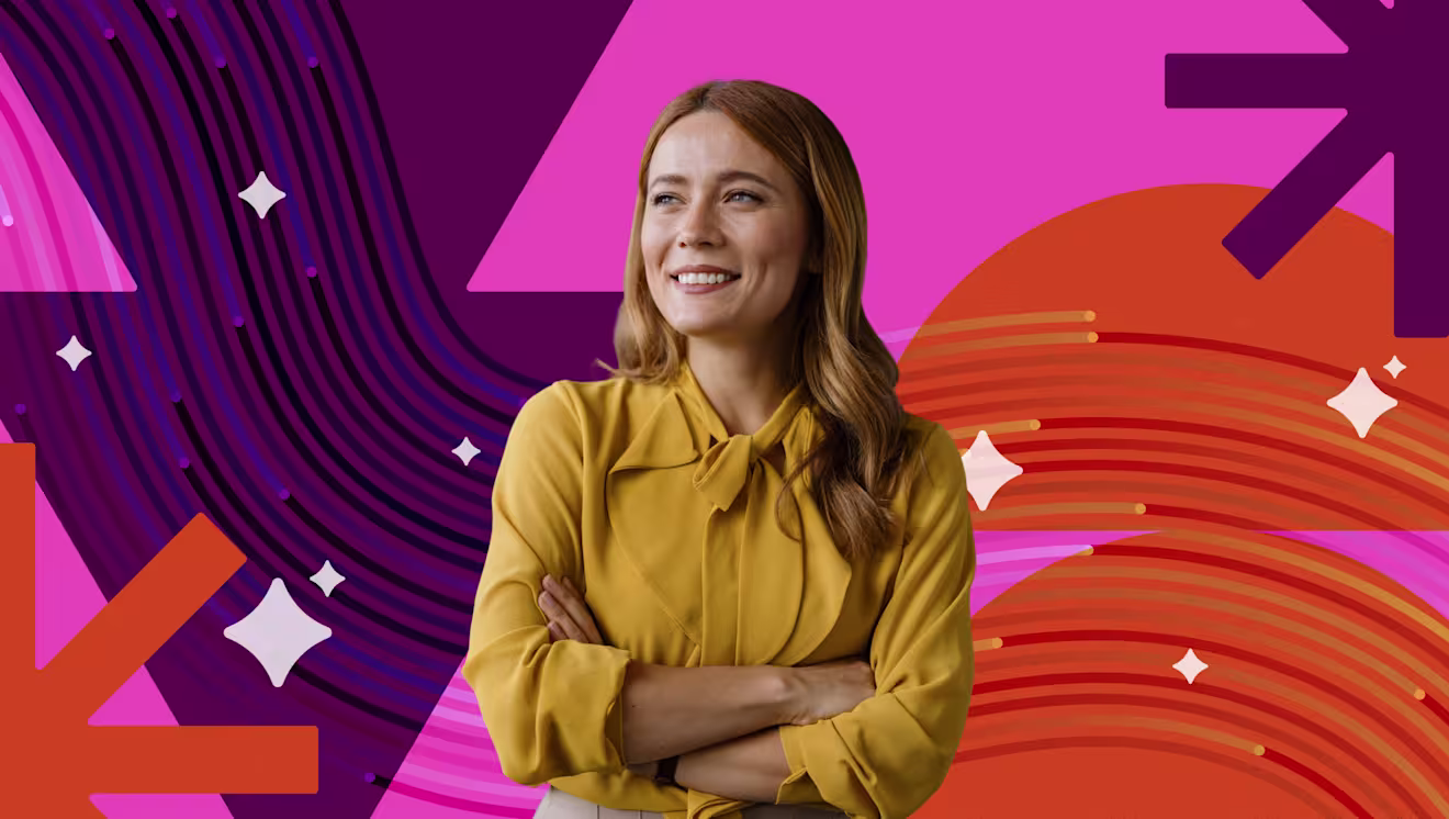 Smiling woman in yellow blouse with arms crossed against vibrant purple, pink, and orange geometric background with stars.
