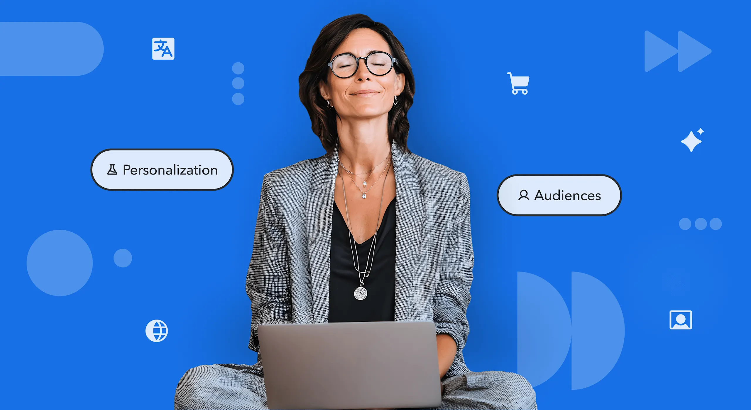 Professional in glasses using laptop against blue background with floating icons for Personalization and Audiences features