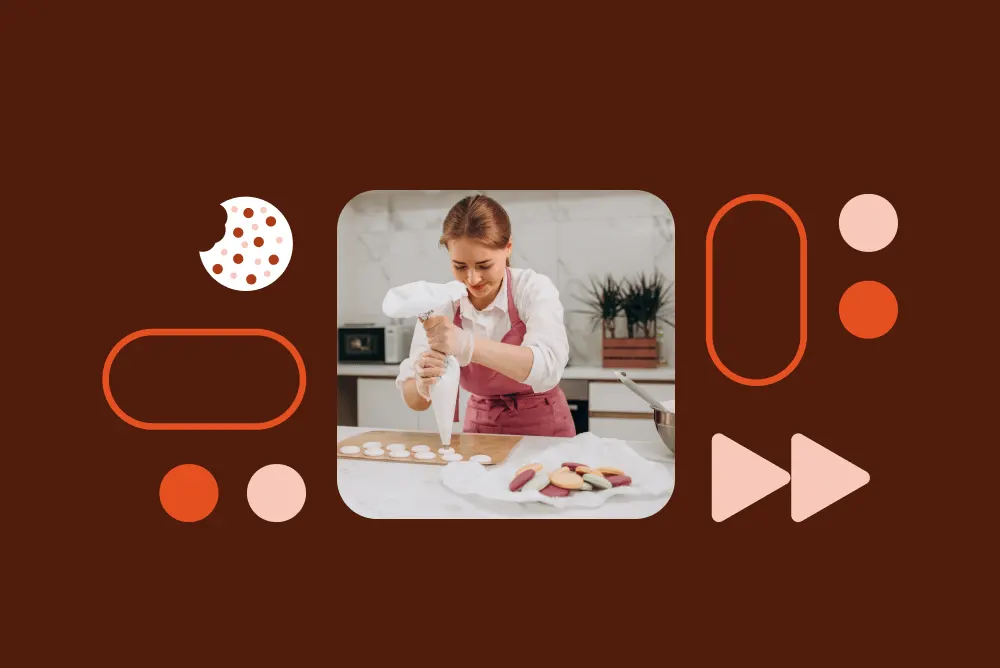 Baker in pink apron decorating cookies with piping bag in kitchen, surrounded by geometric shapes on brown background