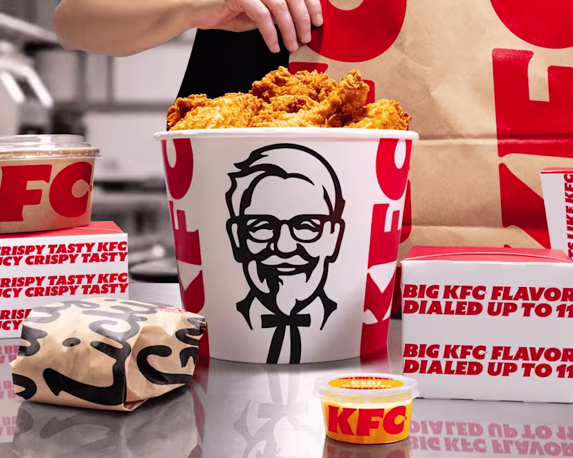 A selection of KFC products on a table viewed from above.