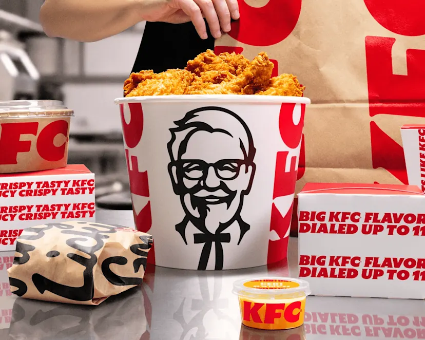 A selection of KFC products on a table viewed from above.