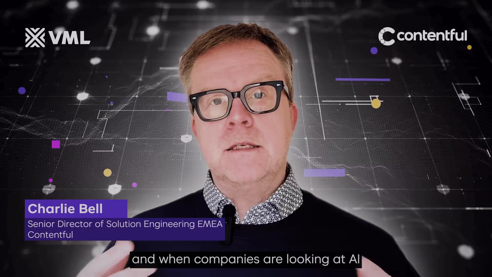 Charlie Bell in black sweater and glasses against digital background with VML and Contentful logos, discussing AI technology.