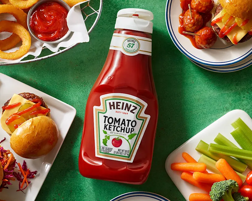 A Heinz ketchup bottle on a table viewed from above.