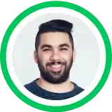 Headshot portrait of a smiling person with dark beard against green circular background