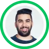 Headshot portrait of a smiling person with dark beard against green circular background