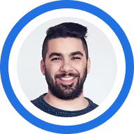 A circular profile photo showing a man smiling.