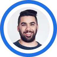 A circular profile photo showing a man smiling.