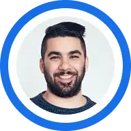 A circular profile photo showing a man smiling.