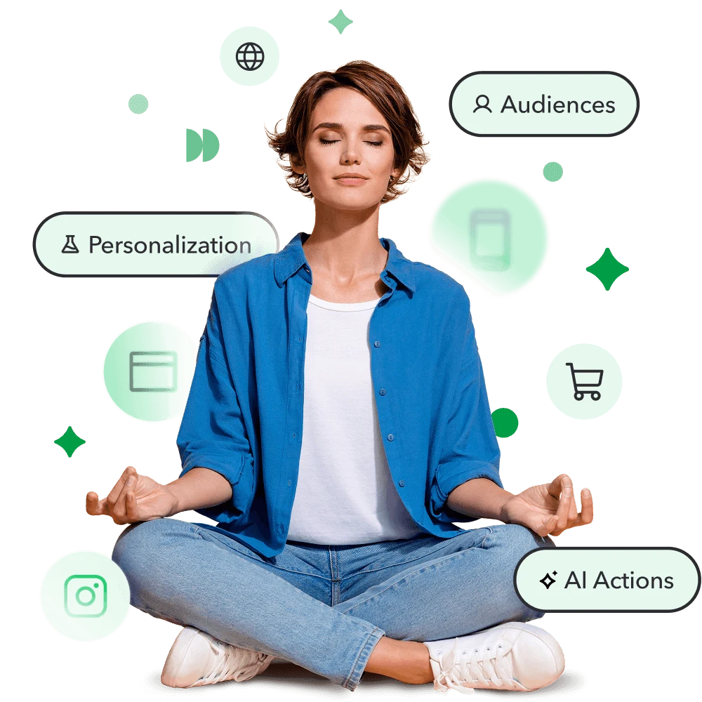 Person in casual blue outfit meditating, surrounded by digital marketing icons for Personalization, AI Actions, and Audiences